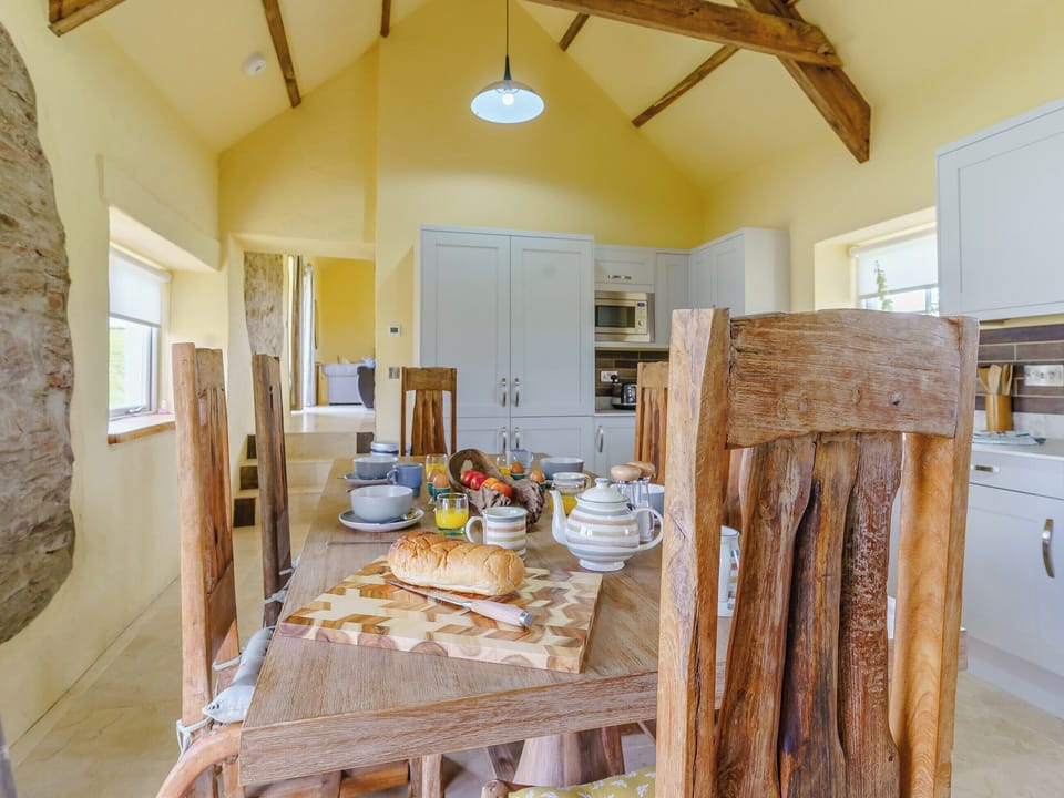Spacious kitchen with dining area | The Stables - Musselwick Farm, St Brides