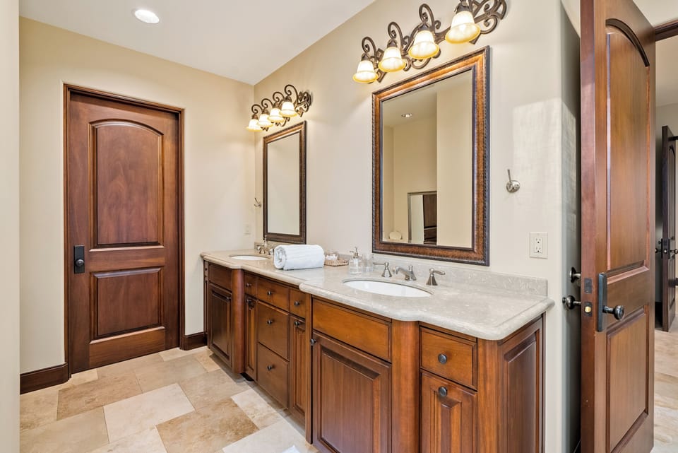 Dual sink vanity in primary bedroom