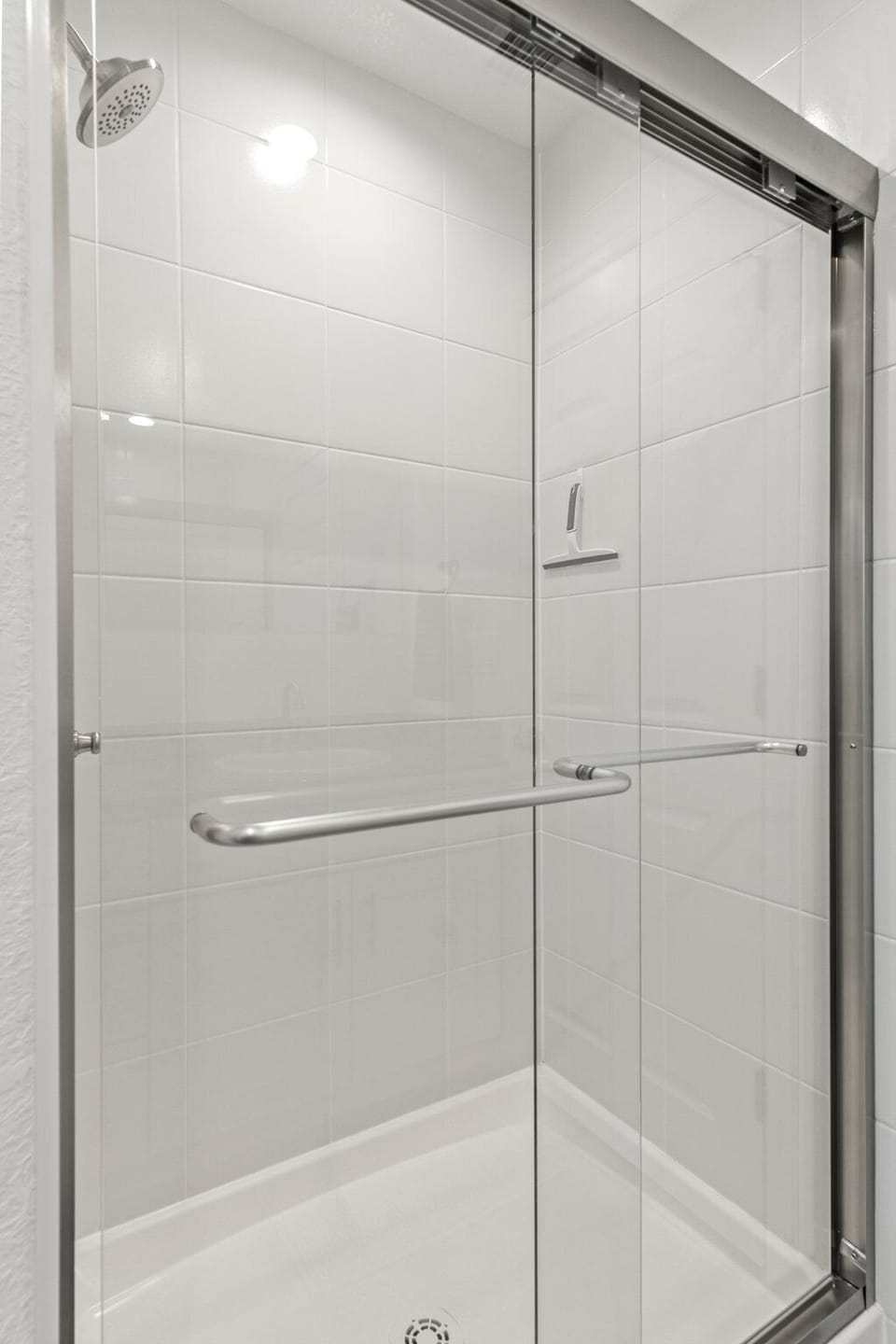 Master bathroom with a tub and a separate shower