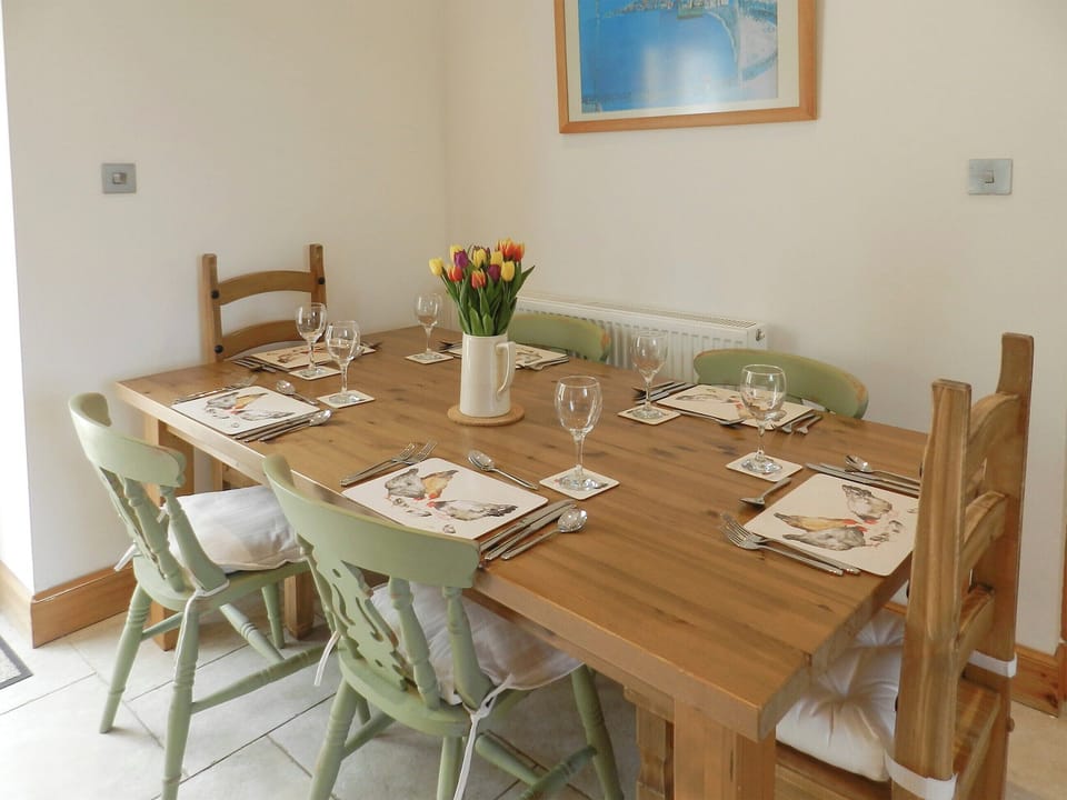 Convenient dining area within kitchen | Torbeg Farm Cottage, Torbeg, near Blackwaterfoot, Isle of Arran