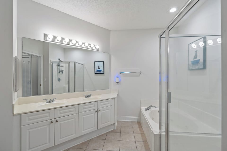 Get ready for a night on the town in this spacious bathroom with double sinks.
