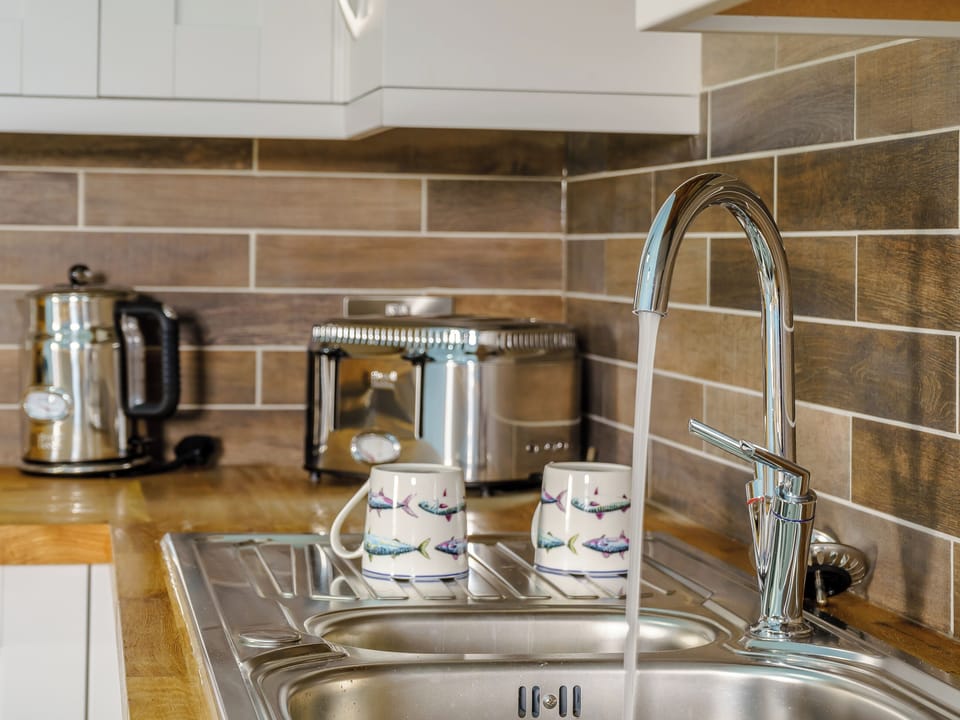 Well-equipped kitchen | The Cowshed - Musselwick Farm, St Brides