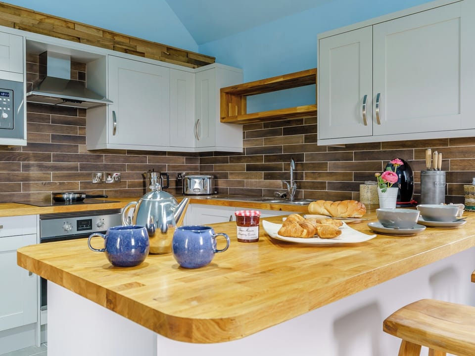 Modern kitchen area | The Cowshed - Musselwick Farm, St Brides