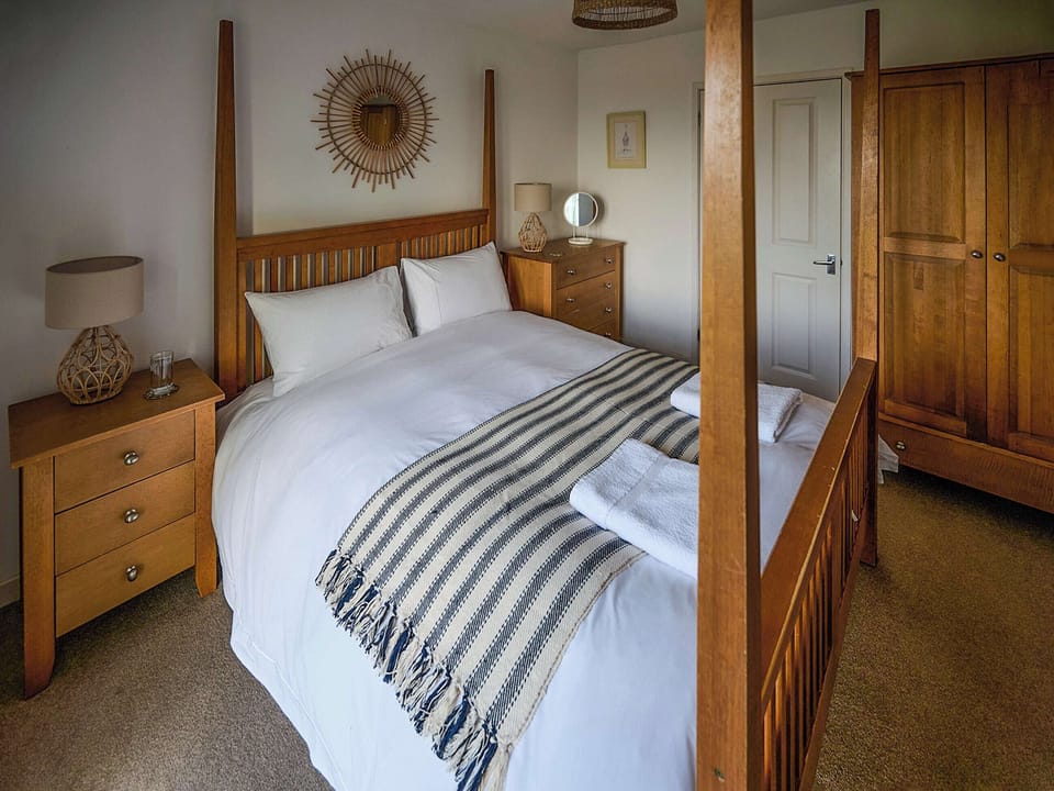 Master bedroom | The Mill - Bach Wen Cottages, Clynnog Fawr