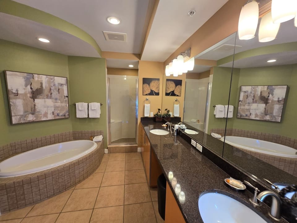 Ensuite full bathroom 1 with garden tub and walk-in shower.
