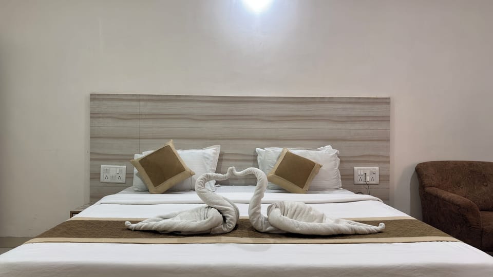 Premium Room | Premium bedding, down comforters, memory foam beds, WiFi (free)