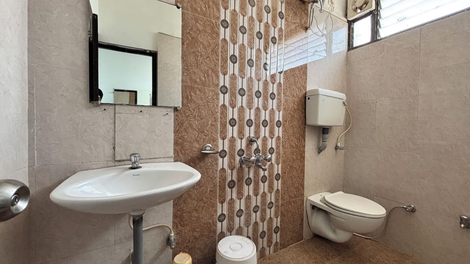 Family Room | Bathroom | Designer toiletries, soap, shampoo, toilet paper