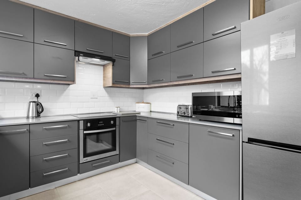Villa | Private kitchen | Electric kettle, highchair