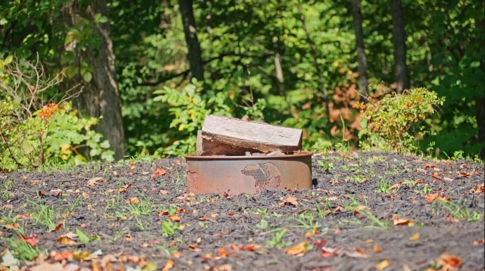 Cozy firepit ring just steps from the hot tub.