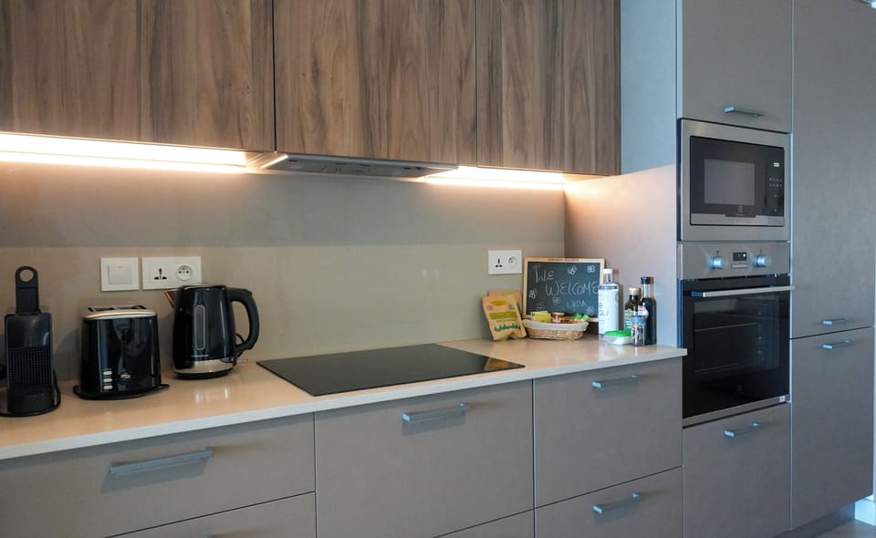 Espresso maker, electric kettle, highchair, paper towels