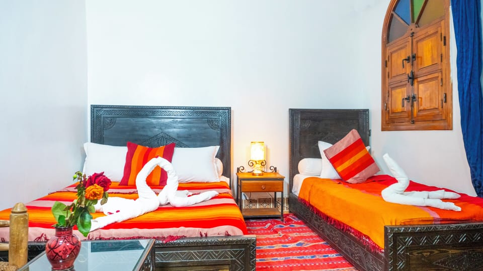 Triple Room, Courtyard View | Desk, free WiFi