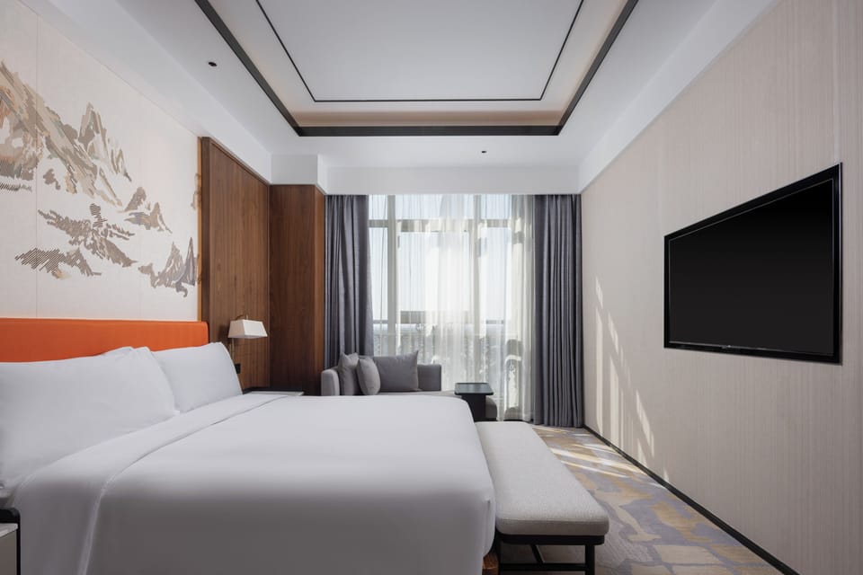 Deluxe Suite, 1 King Bed | Down comforters, minibar, in-room safe, desk