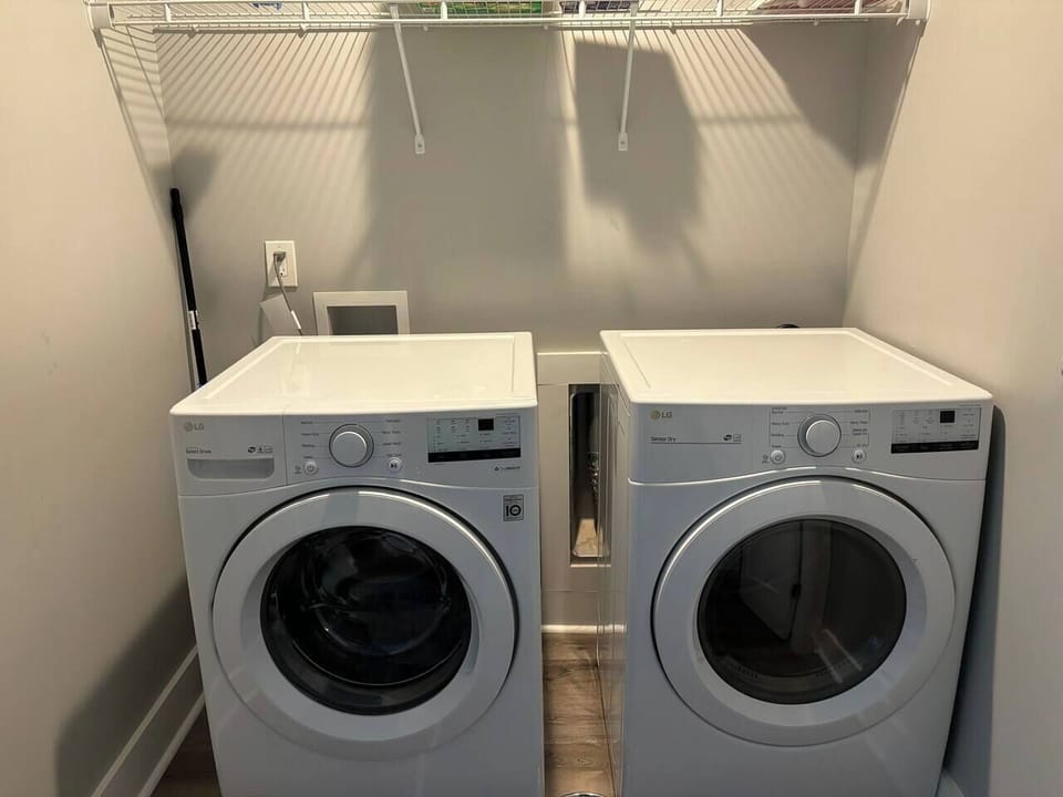 Laundry Room: Modern washer and dryer for effortless cleaning between adventures!