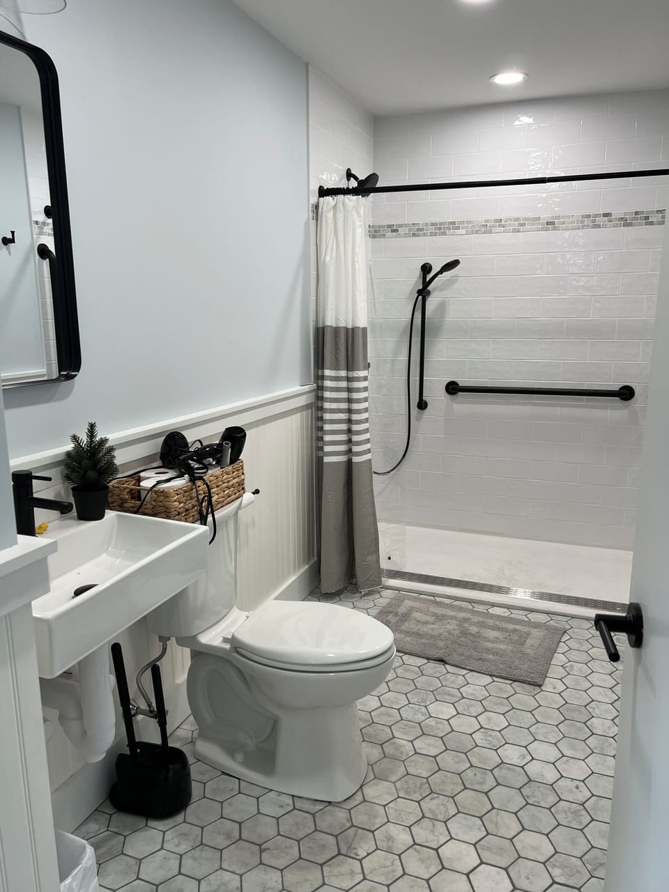 ADA bath with grab bars&zero entry for wheel chair transfer.  Shower seat avail.