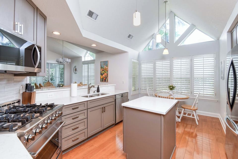 Kitchen Island and Stainless Steel Appliances