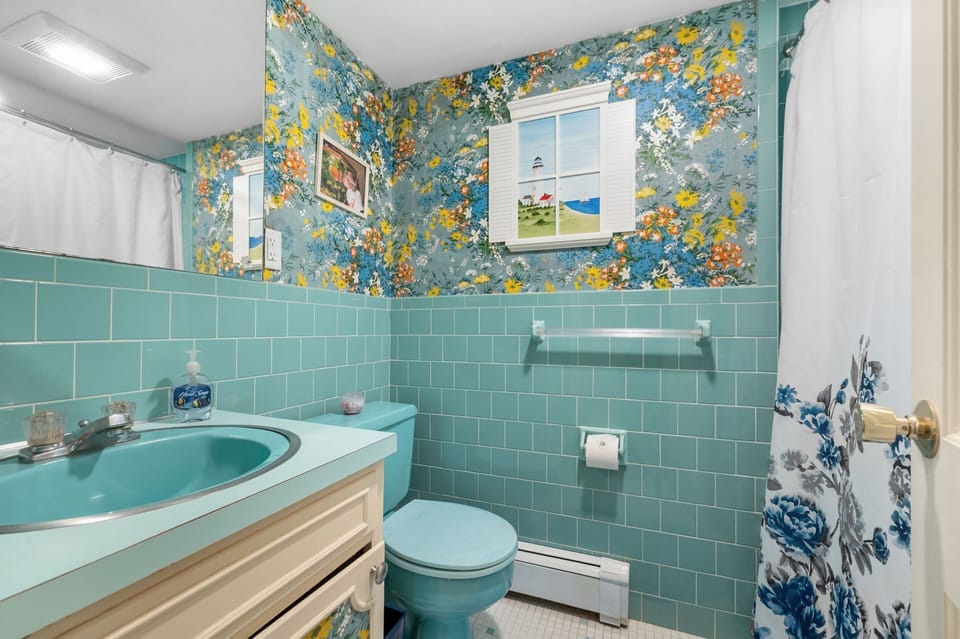 Bathroom Two is in the hallway of the upper level and is shared by Bedroom Two and Bedroom Three - 38 Monomoyic Way Chatham Cape Cod-Poppy's Place-NEVR