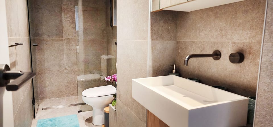 Bathroom with underfloor heating and walk-in shower