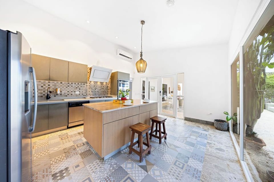 Cook up a storm in our fully equipped kitchens! With all the modern amenities and a seamless flow to cozy dining areas, you'll feel right at home whether preparing a snack or a family feast.
