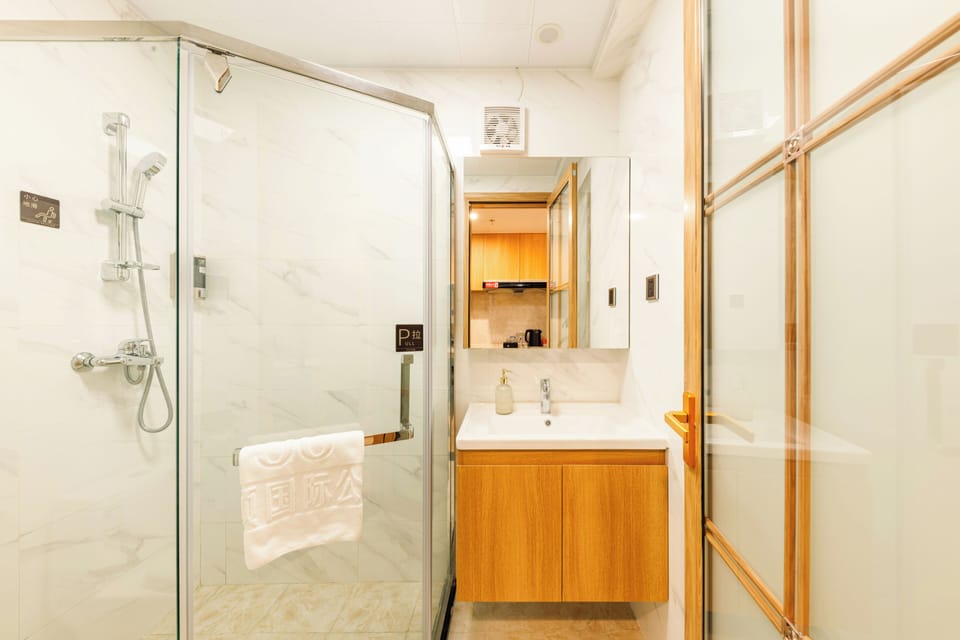 Basic Twin Room, Balcony, City View | Bathroom | Shower, free toiletries, hair dryer, slippers