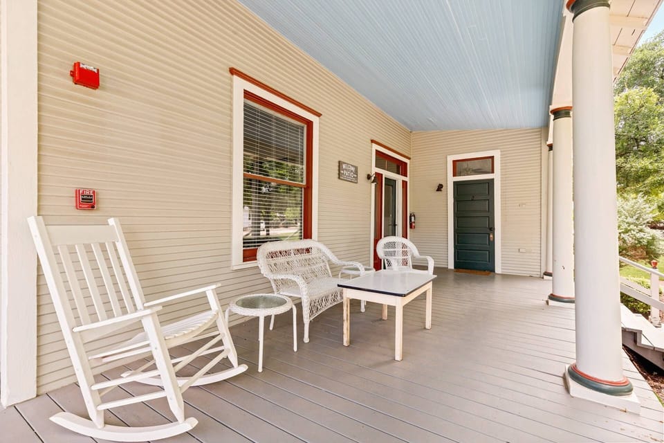 The perfect spot for your morning coffee, the shared front porch offers a welcoming rocking chair and patio furniture.