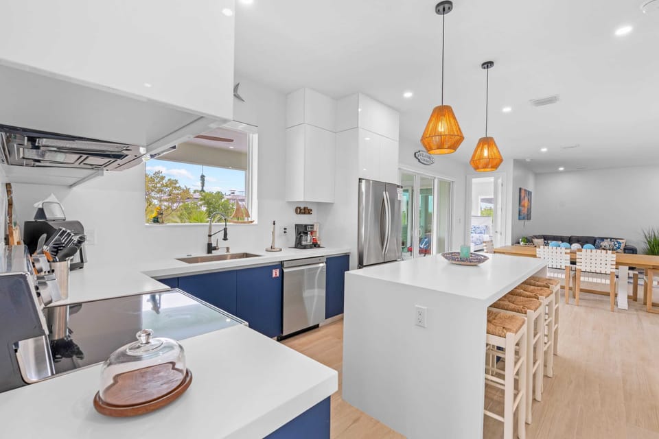The kitchen island offers additional seating, making it an excellent spot for casual breakfasts or snacks.