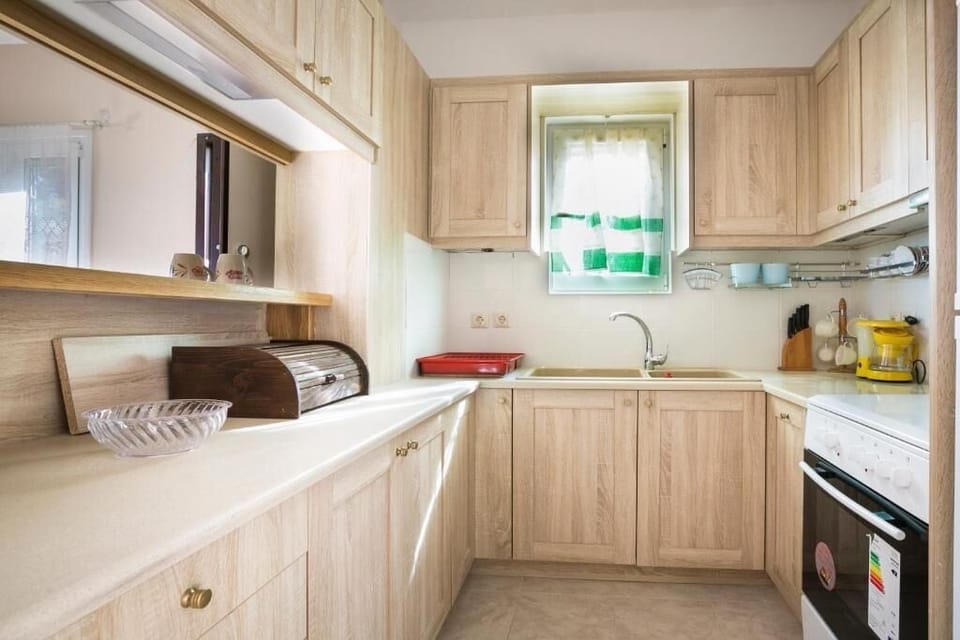 Family Villa, Balcony | Private kitchen | Highchair