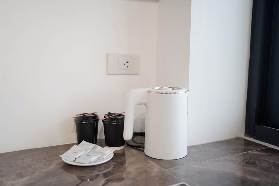 Penthouse | Private kitchen | Coffee/tea maker, electric kettle