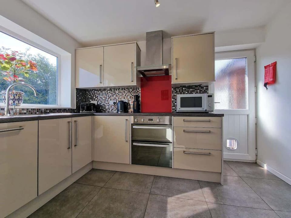 A washing machine for your clothes makes this home perfect for longer stays
