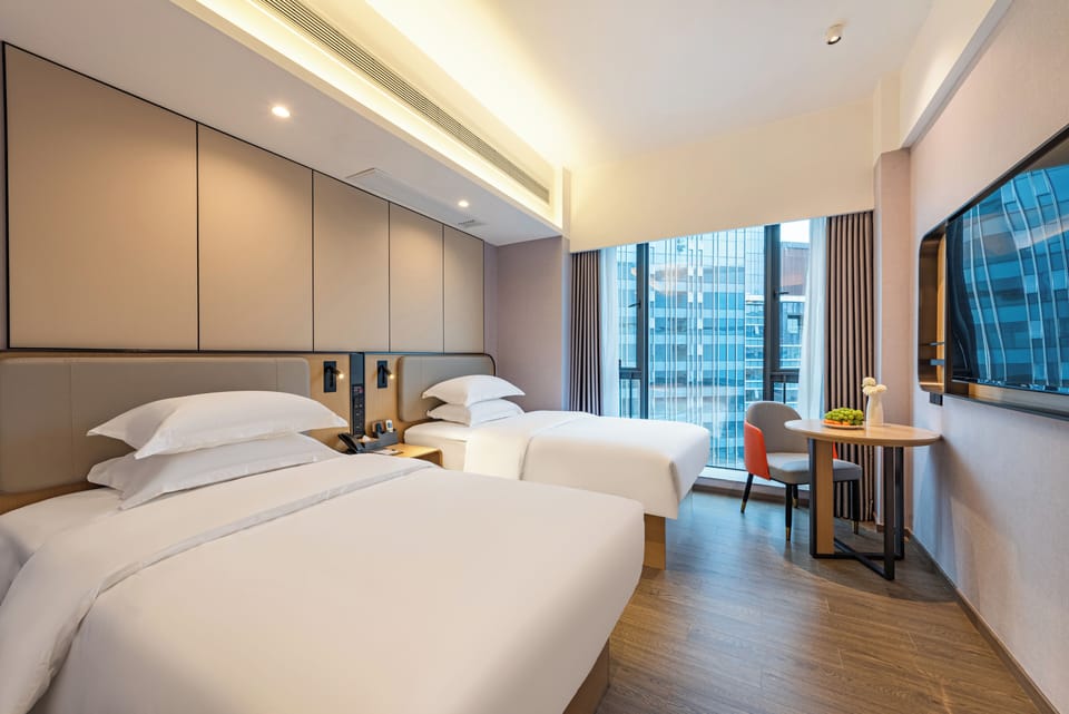 City View Twin Room | Desk, laptop workspace, blackout drapes, free WiFi