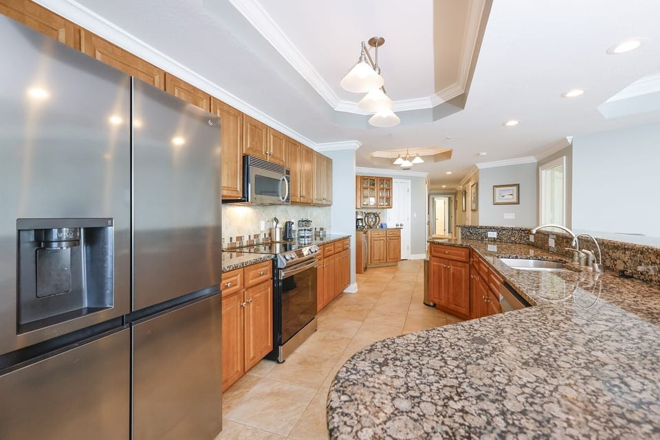 Condo, 5 Bedrooms | Private kitchen | Coffee/tea maker, fridge, oven