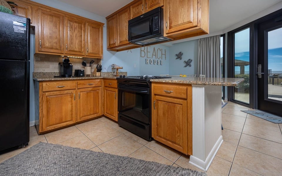 Condo, 2 Bedrooms | Private kitchen | Coffee/tea maker, fridge, oven