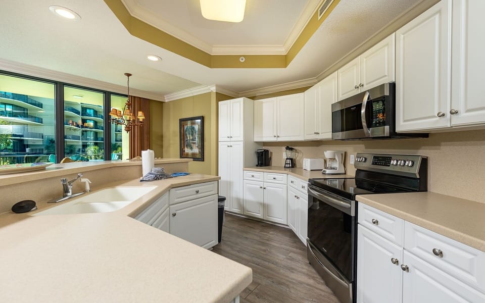 Condo, 2 Bedrooms | Private kitchen | Coffee/tea maker, fridge, oven