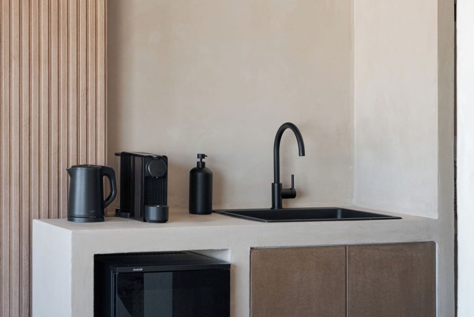 Exclusive Apartment, Balcony, City View | Private kitchenette | Mini-fridge, electric kettle, toaster, eco-friendly cleaning products