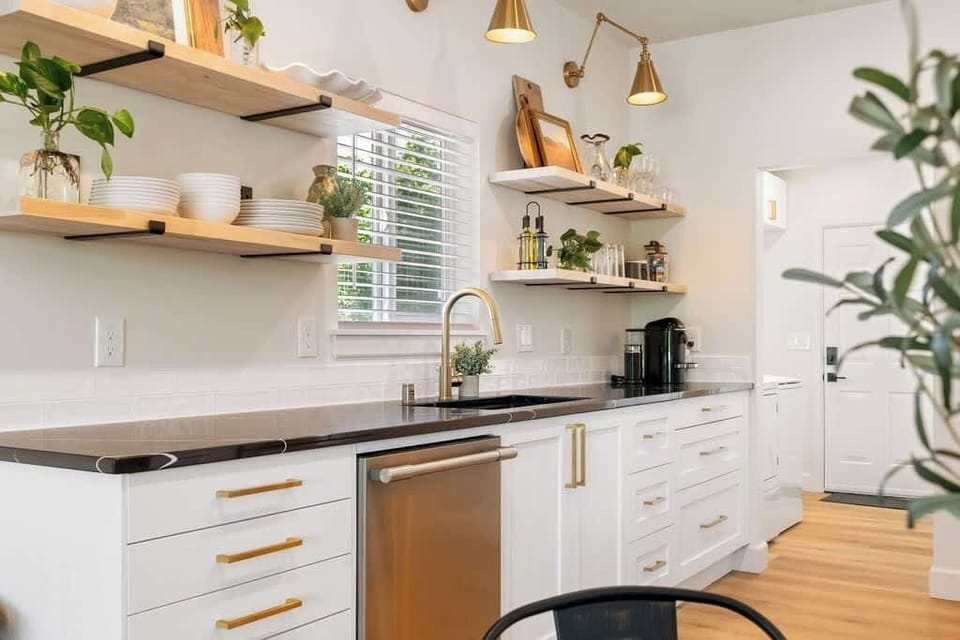 Well-stocked with all the essentials, including cookware, utensils, and appliances. You'll find everything you need to prepare meals with ease, making it perfect for both quick snacks and elaborate dinners.