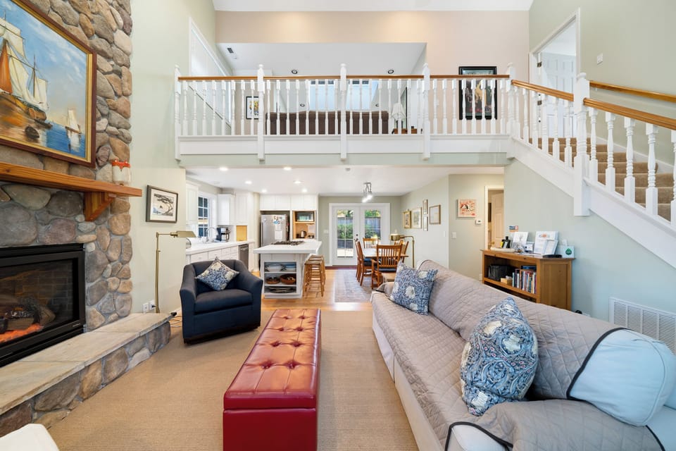 Open living space with kitchen, dining and living room.