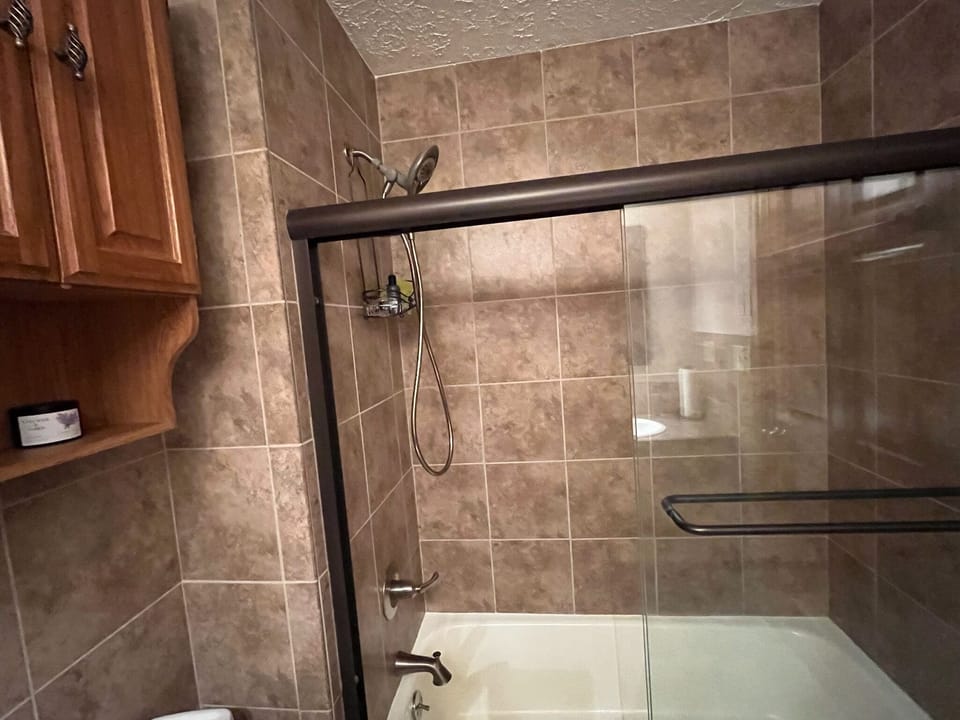A view of the main upstairs bathroom tub/shower