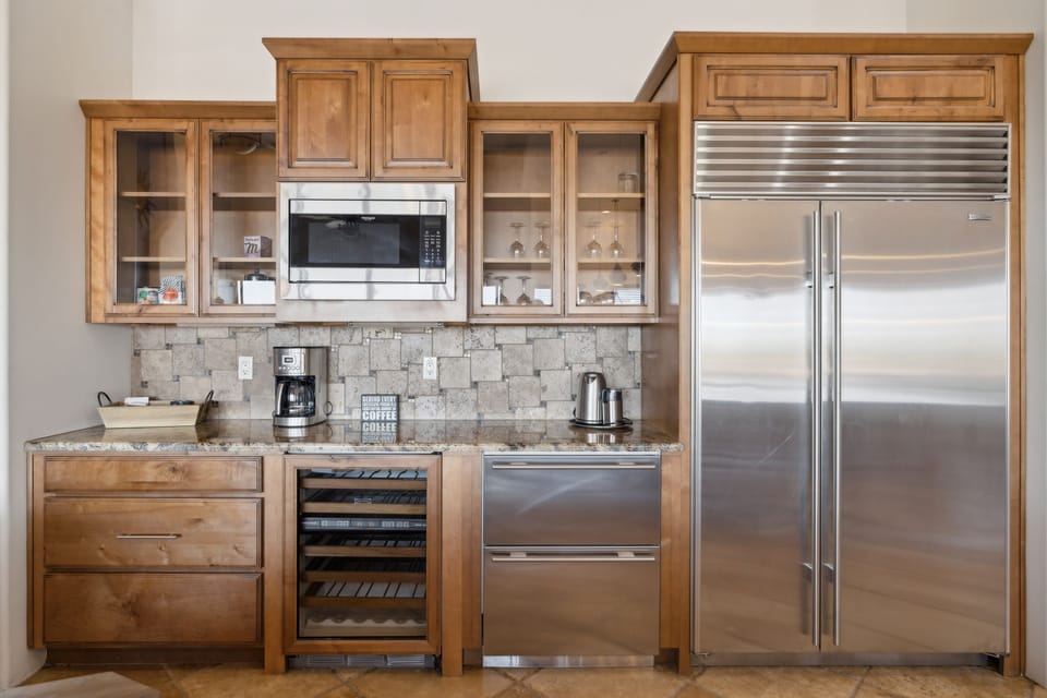 Whip up your favorites in this cheerful and fully equipped kitchen, perfect for group meals and morning coffee chats. | The Sonoran, Scottsdale, Arizona | Voyax Luxury Vacation Rentals