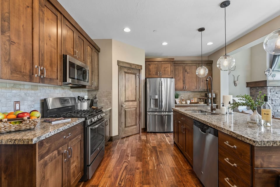 Kitchen is fully equipped with everything you need for comfortable meal preparation and cooking, including essentials like pots, pans, spices, and more | Noah's Retreat, Park City, Utah | Voyax Luxury Vacation Rentals