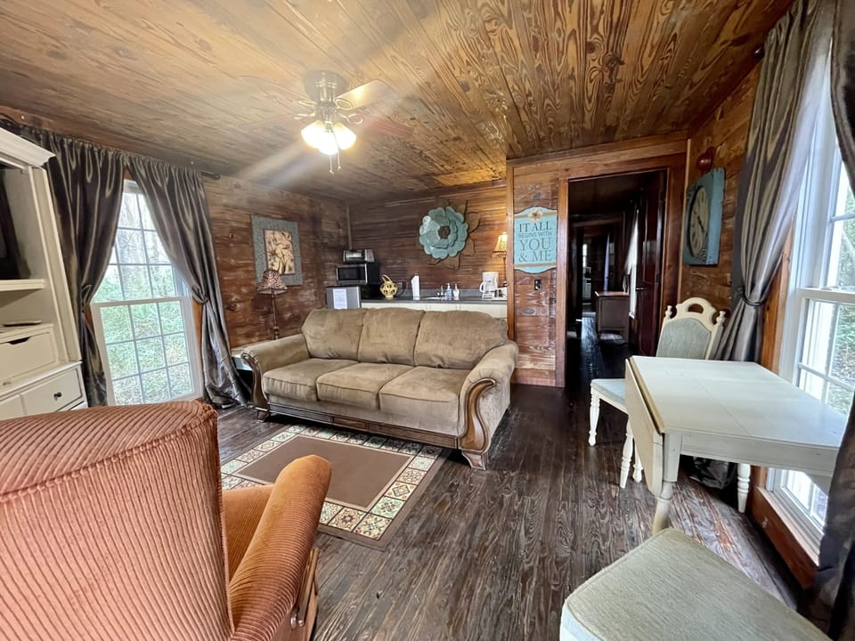 Living area & kitchenette with mini fridge, microwave & toaster oven