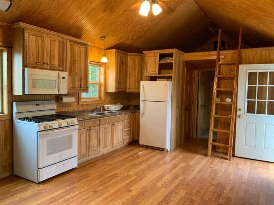 Loft space has additional sleeping area or storage area on both ends of the cabin