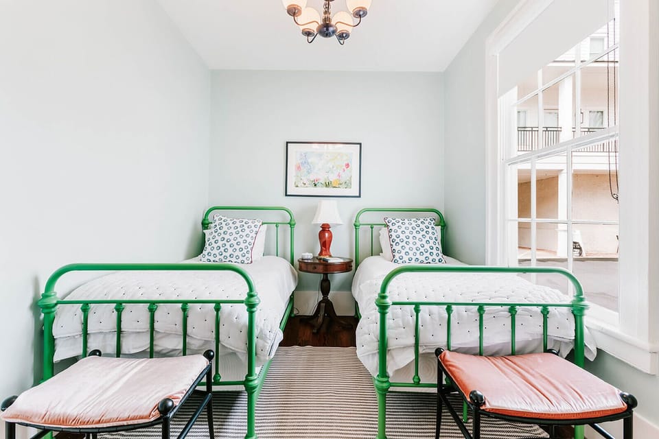 Smaller bedroom in Poseidon Suite with 2 twin beds. 