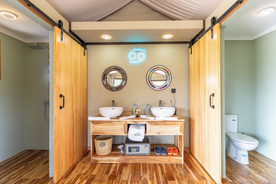 Separate tub and shower, rainfall showerhead, free toiletries