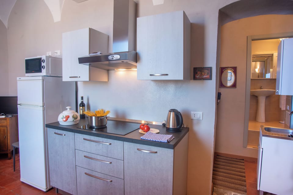 Standard Apartment, Multiple Bedrooms (La Terrazza Del Nonno) | Private kitchen | Fridge, microwave, stovetop, coffee/tea maker
