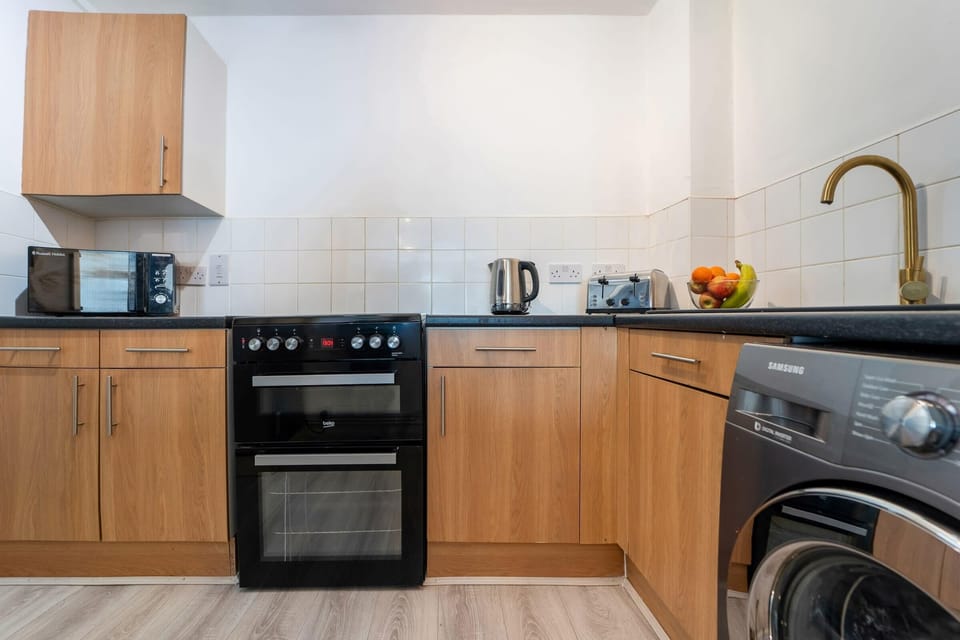 The kitchen is fully equipped to prepare a simple meal