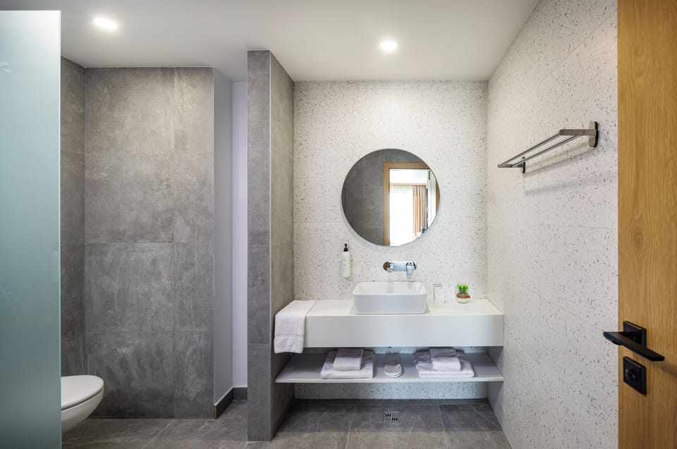 Shower, free toiletries, hair dryer, slippers