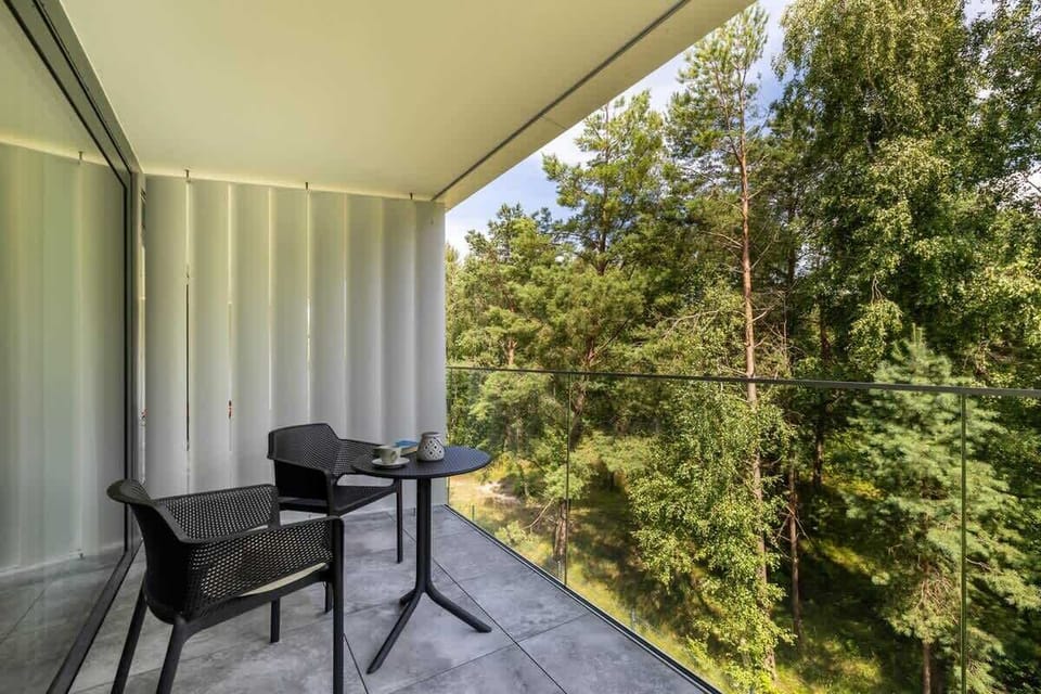 Balcony with chairs overlooking the forest
Peaceful outdoor space — perfect for morning coffee or sunset relaxation.