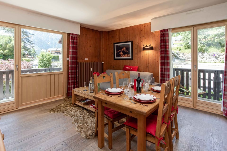 Open plan living/dining room with 2 balconies