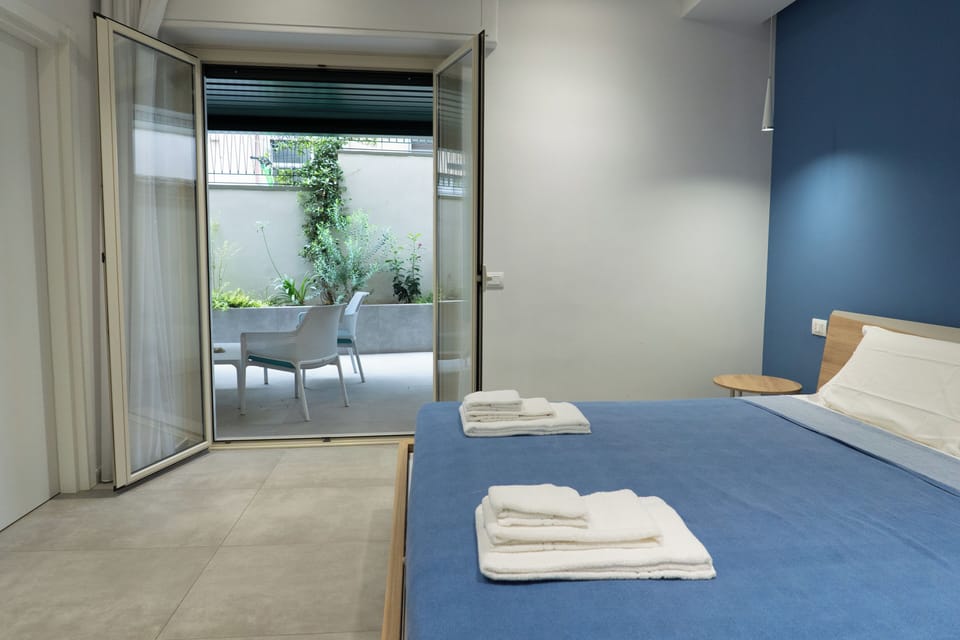 Premium bedding, pillowtop beds, desk, laptop workspace
