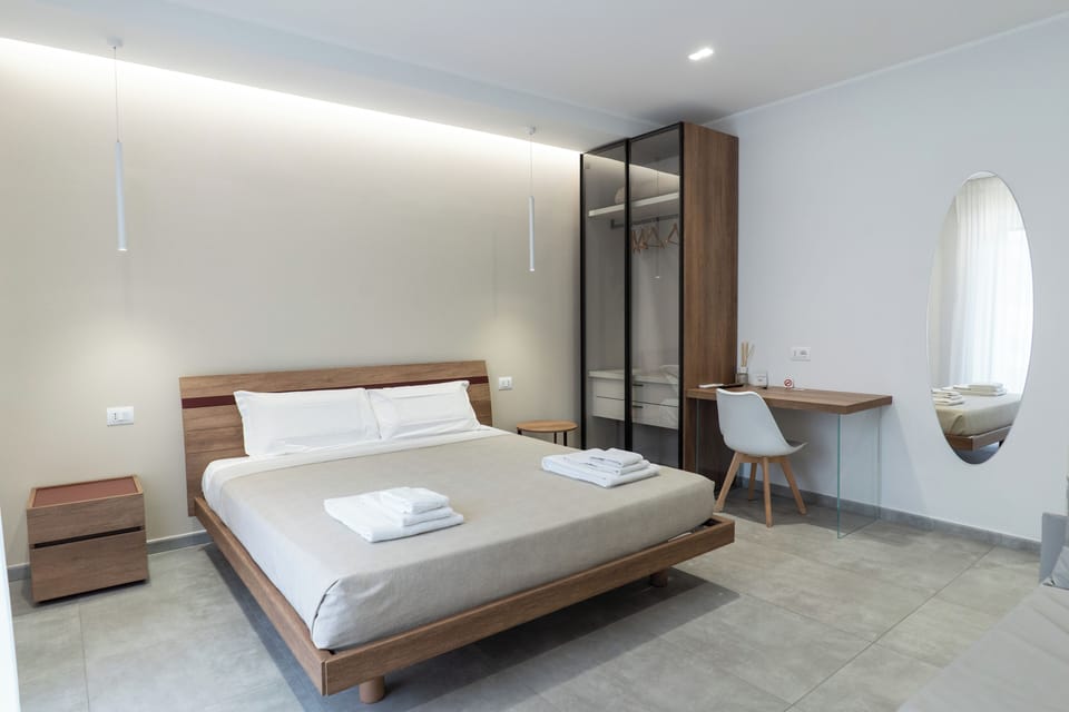 Premium bedding, pillowtop beds, desk, laptop workspace