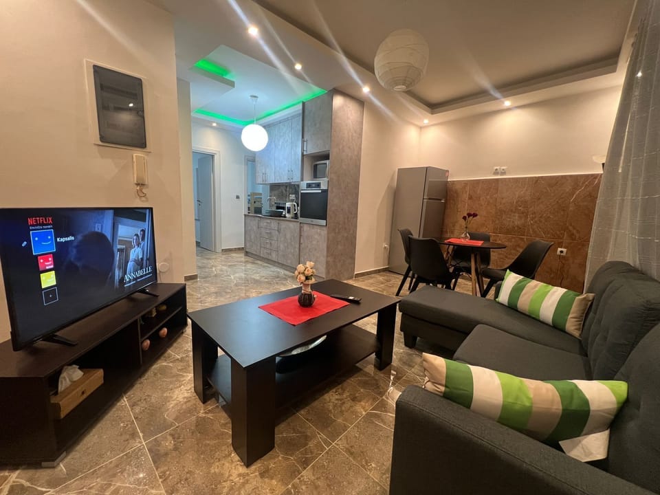Apartment | Living area | 30-inch flat-screen TV with digital channels